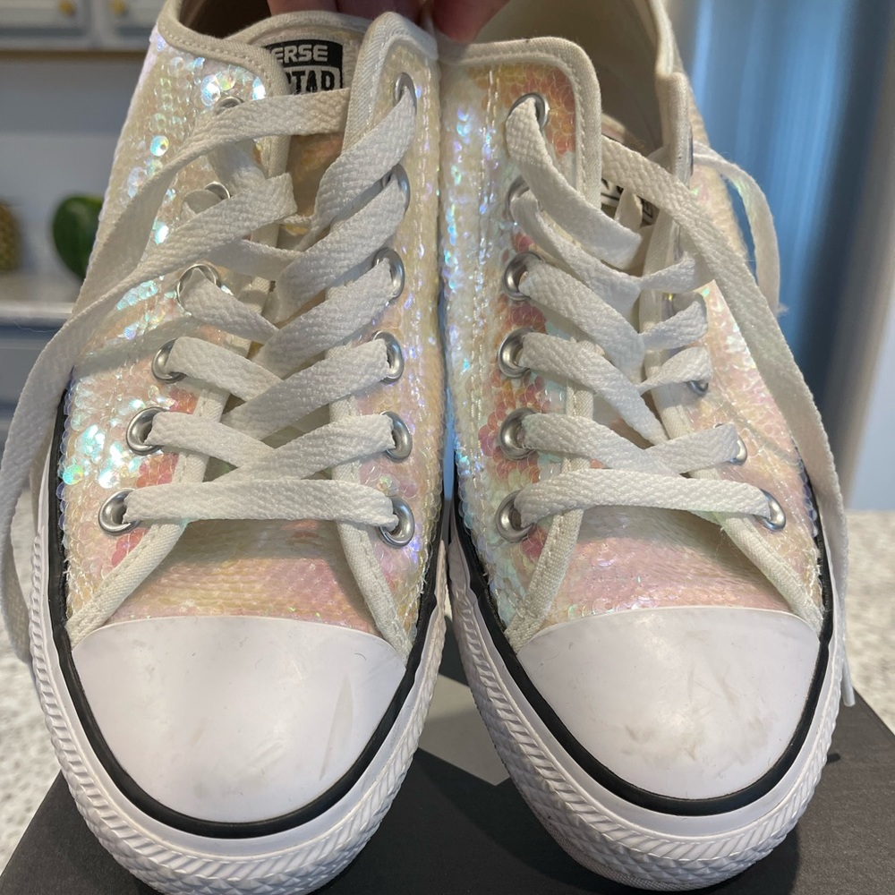 White and pink sequins converse
